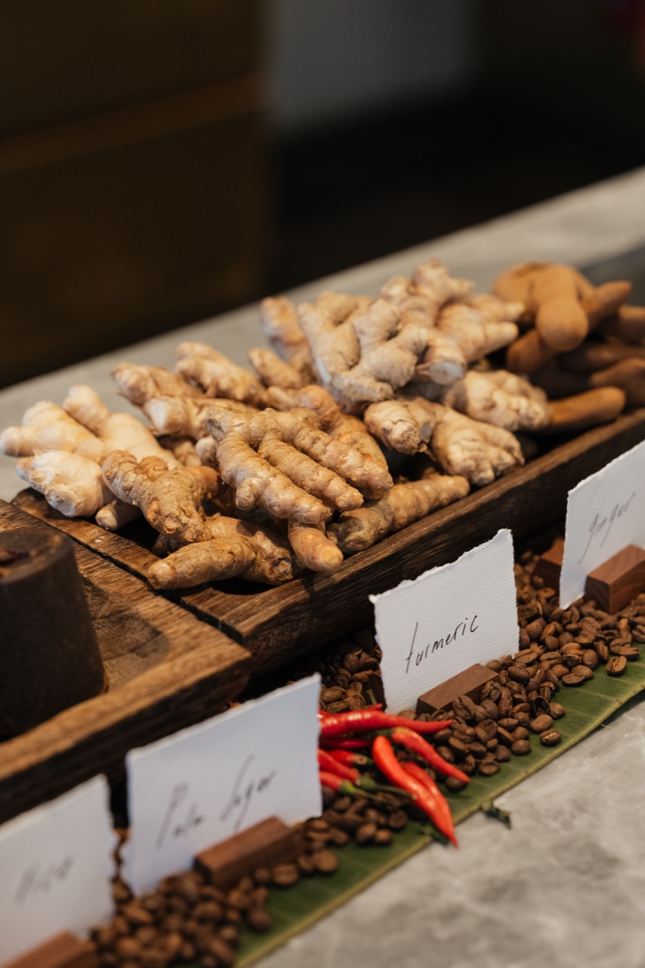 Turmeric and other ingredients arranged at our jamu workshop