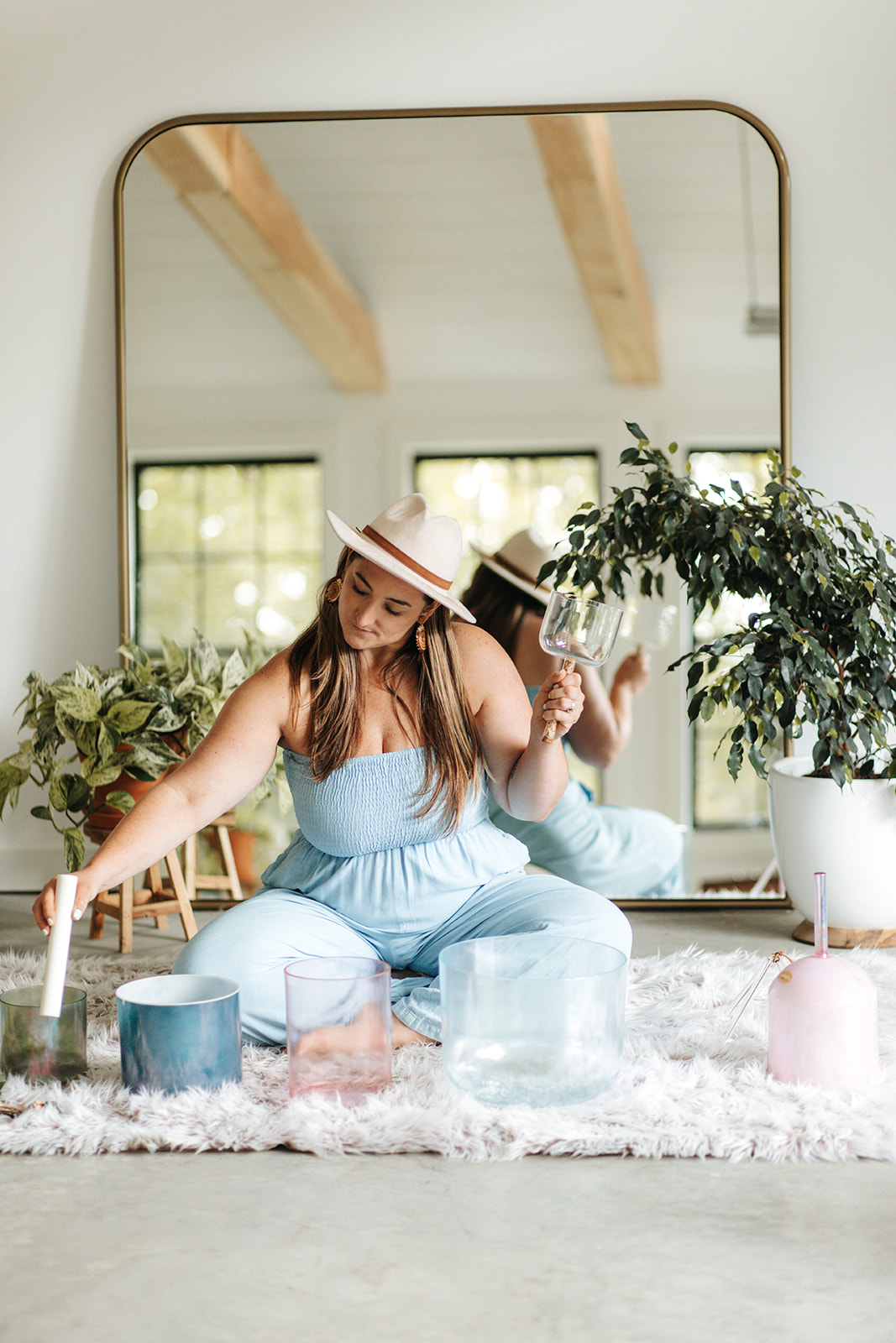 Lauren Nielson playing crystal singing bowls