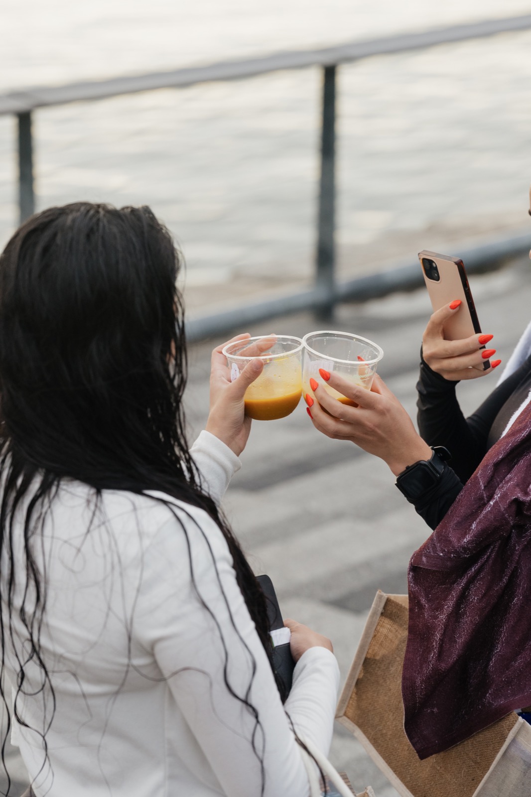 Women sharing jamu